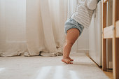 Baby standing up for the first time
