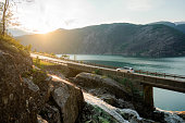 Car on bridge across the river in Norway