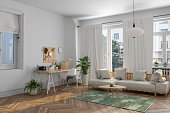 Home Office Interior With Wooden Table, Sofa And Potted Plants. Working At Home