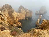 Portugal - Algarve - Lagos - Ponta Da Piedade with fog