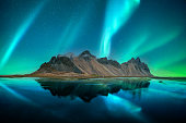 Aurora borealis Northern lights over famous Stokksnes mountains