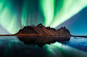 Aurora borealis Northern lights over famous Stokksnes mountains