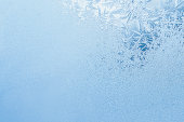 Winter background, frost on window
