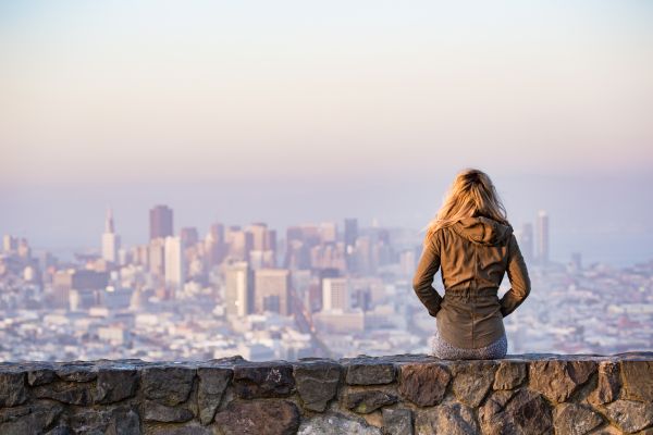 Young Woman Enjoying Moment and Looking Over the San Francisco Free Stock Photo